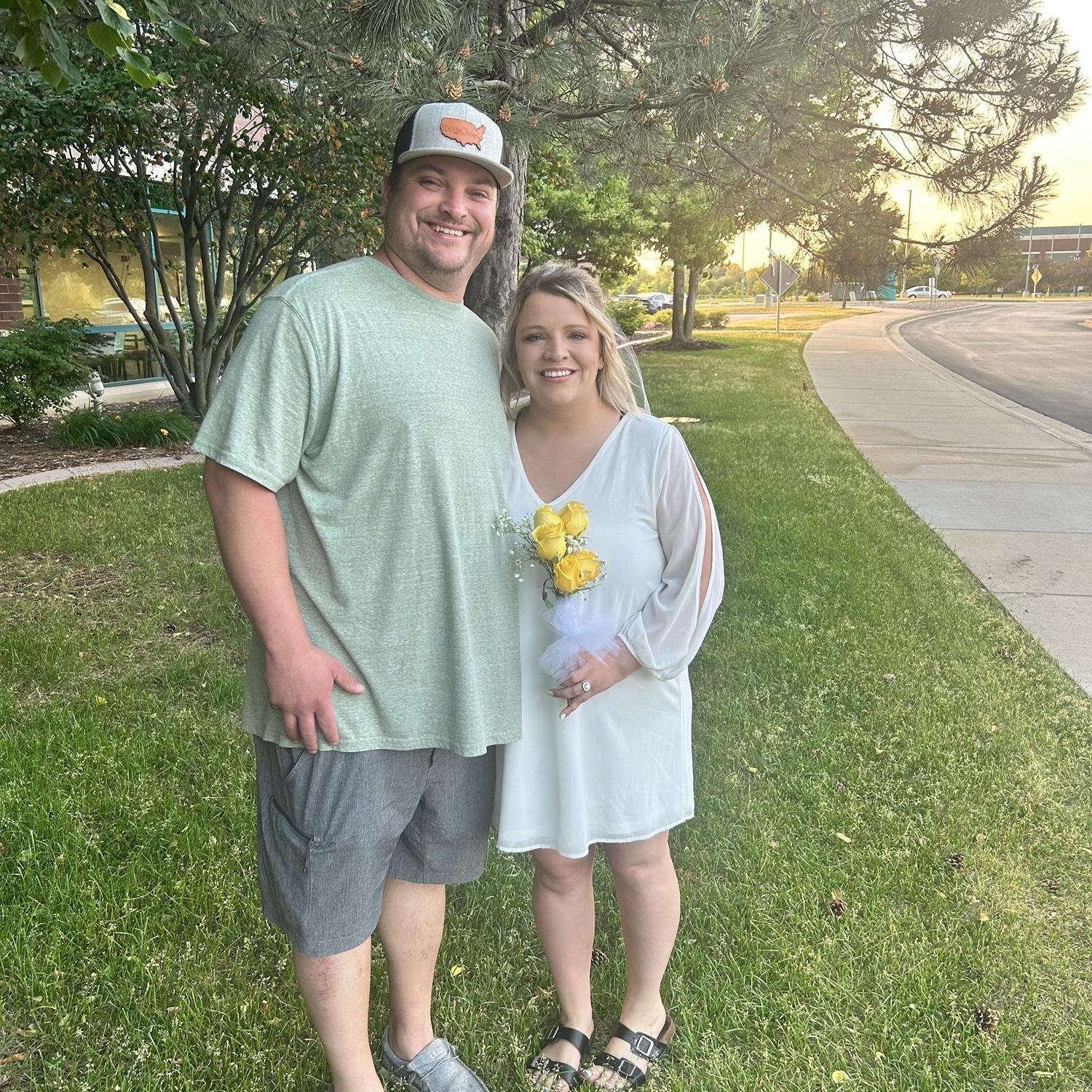 The bride & groom outside the hospital after the commitment ceremony.