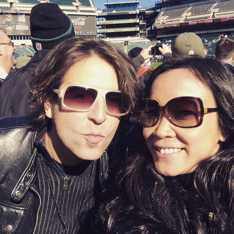 On the sidelines at the Eagles game, November 2015. Some will tell you that Alex is secretly an Eagles fan, but he actually hates football and won these tickets at a charity auction.