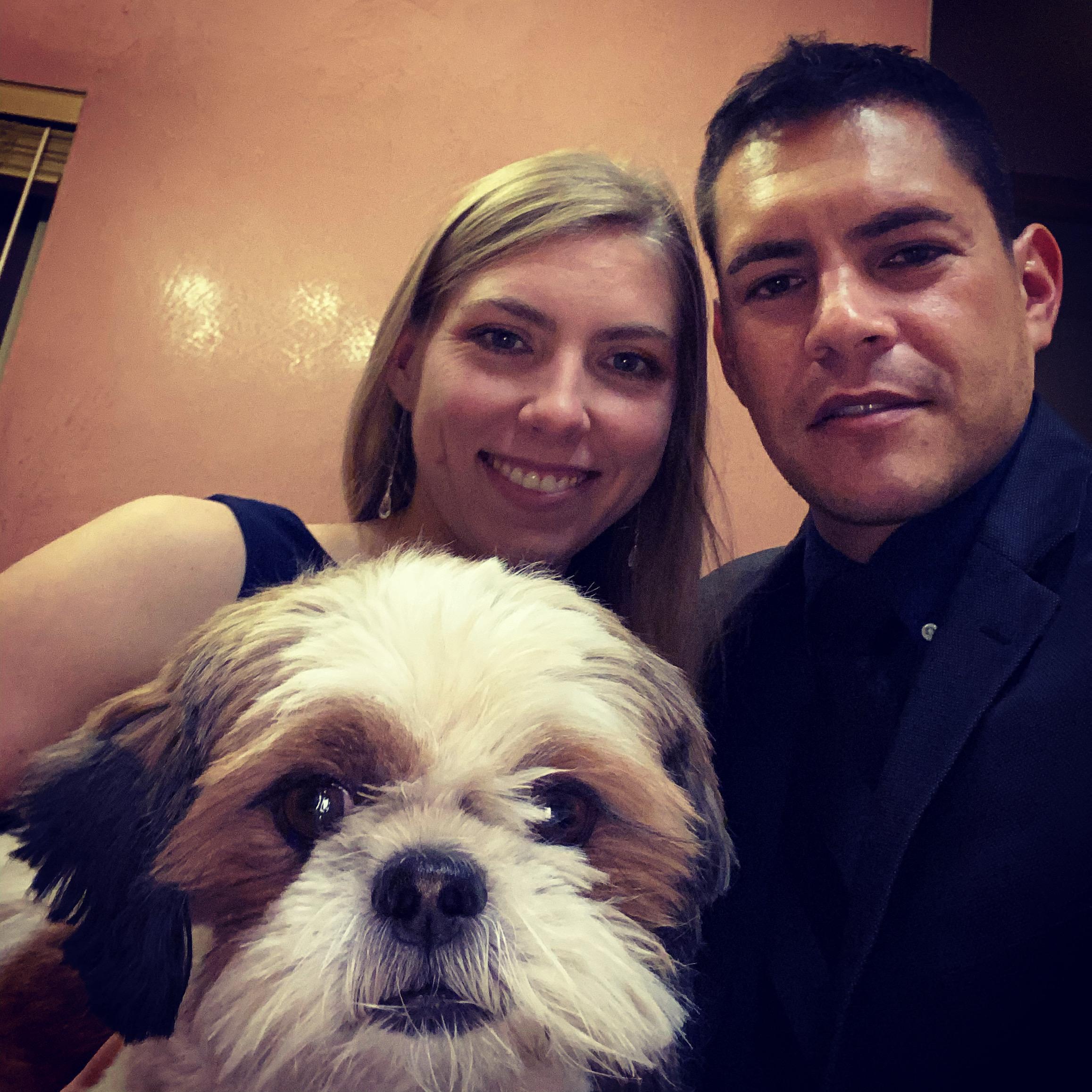 Celebrating Manny's realty award night with our daughter