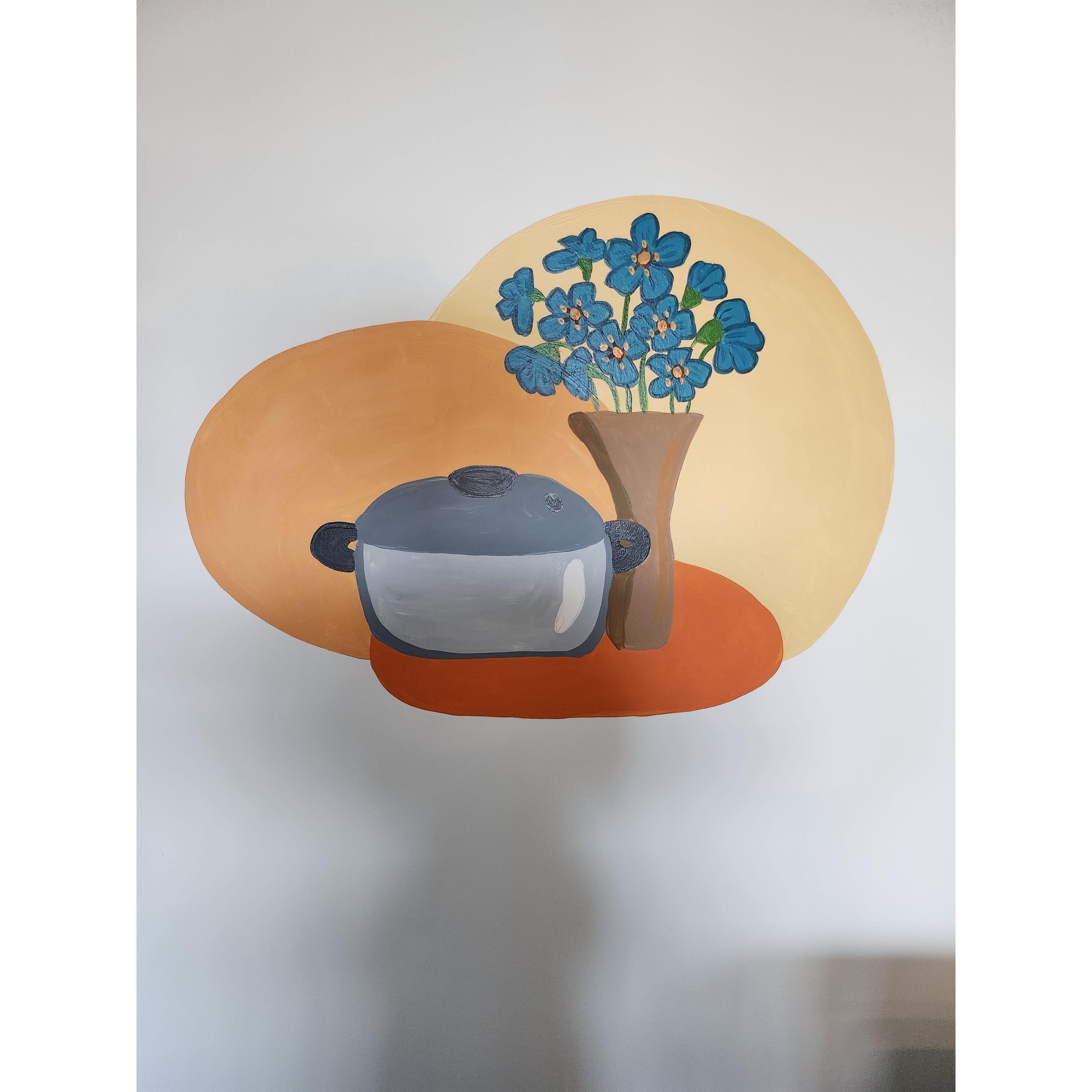 Accent: blue poppies in a vase next to a pressure cooker