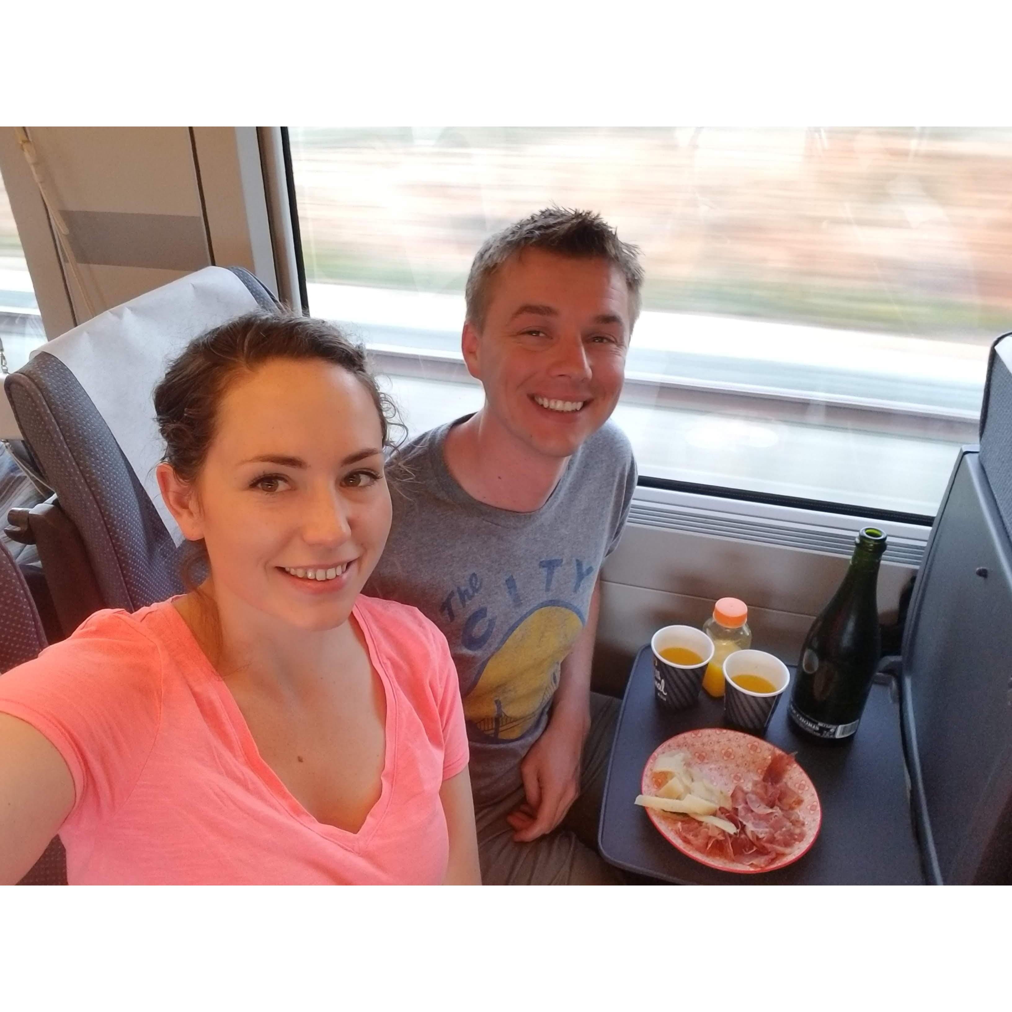 Riding the train across Spain and enjoying prosciutto and champagne