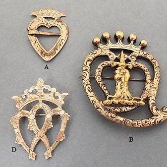 This is a brooch is engraved with two intertwined hearts topped with a crown to represent Mary Queen of Scots. Traditionally given by the groom to his bride before the wedding as a token of his love.