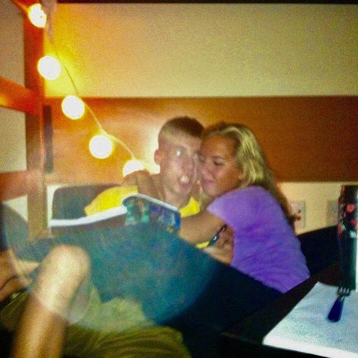 Our first picture together! Cameron studying and Afton being annoying.