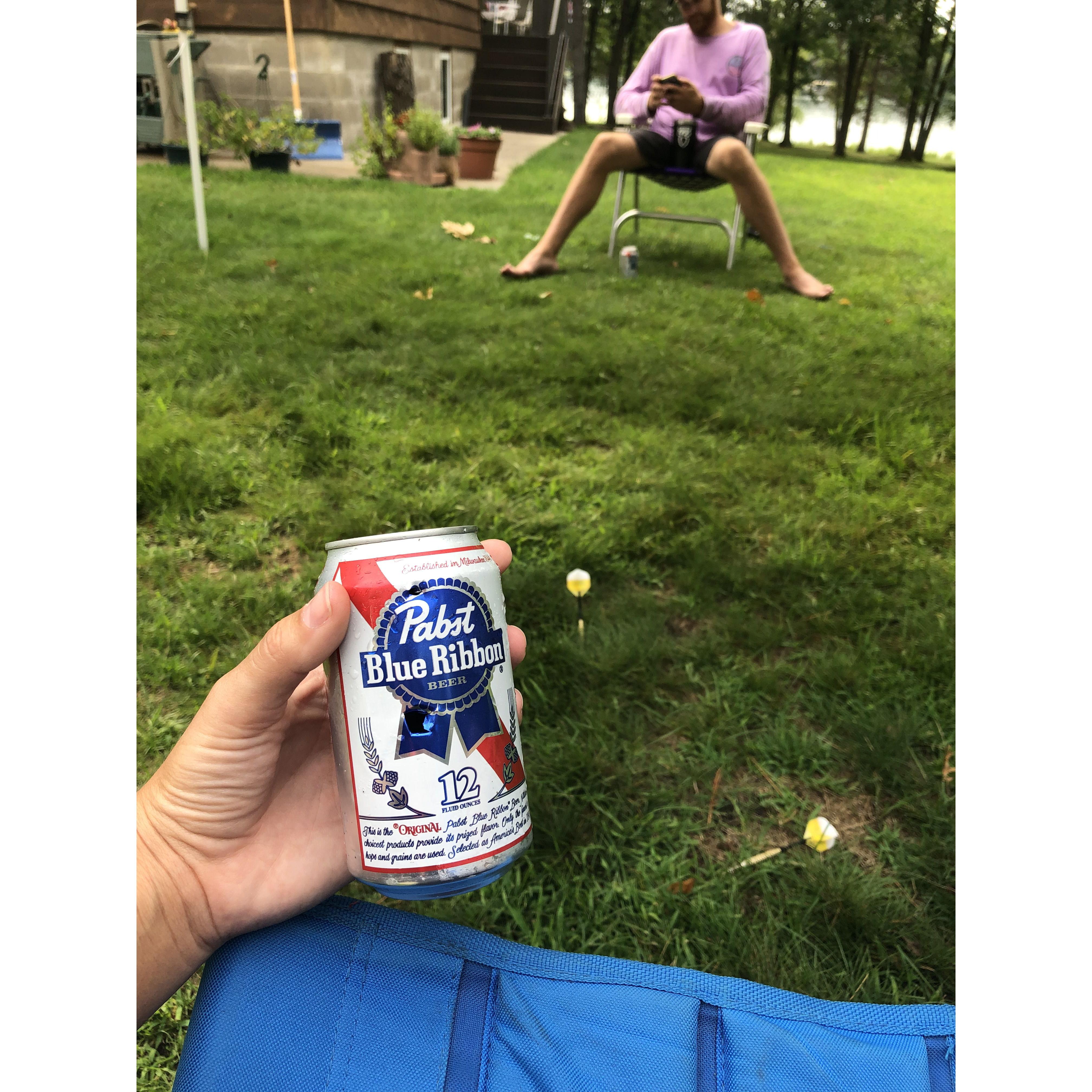 Lawn darts at the lake. Not pictured is the dart fully puncturing Nolin's foot.