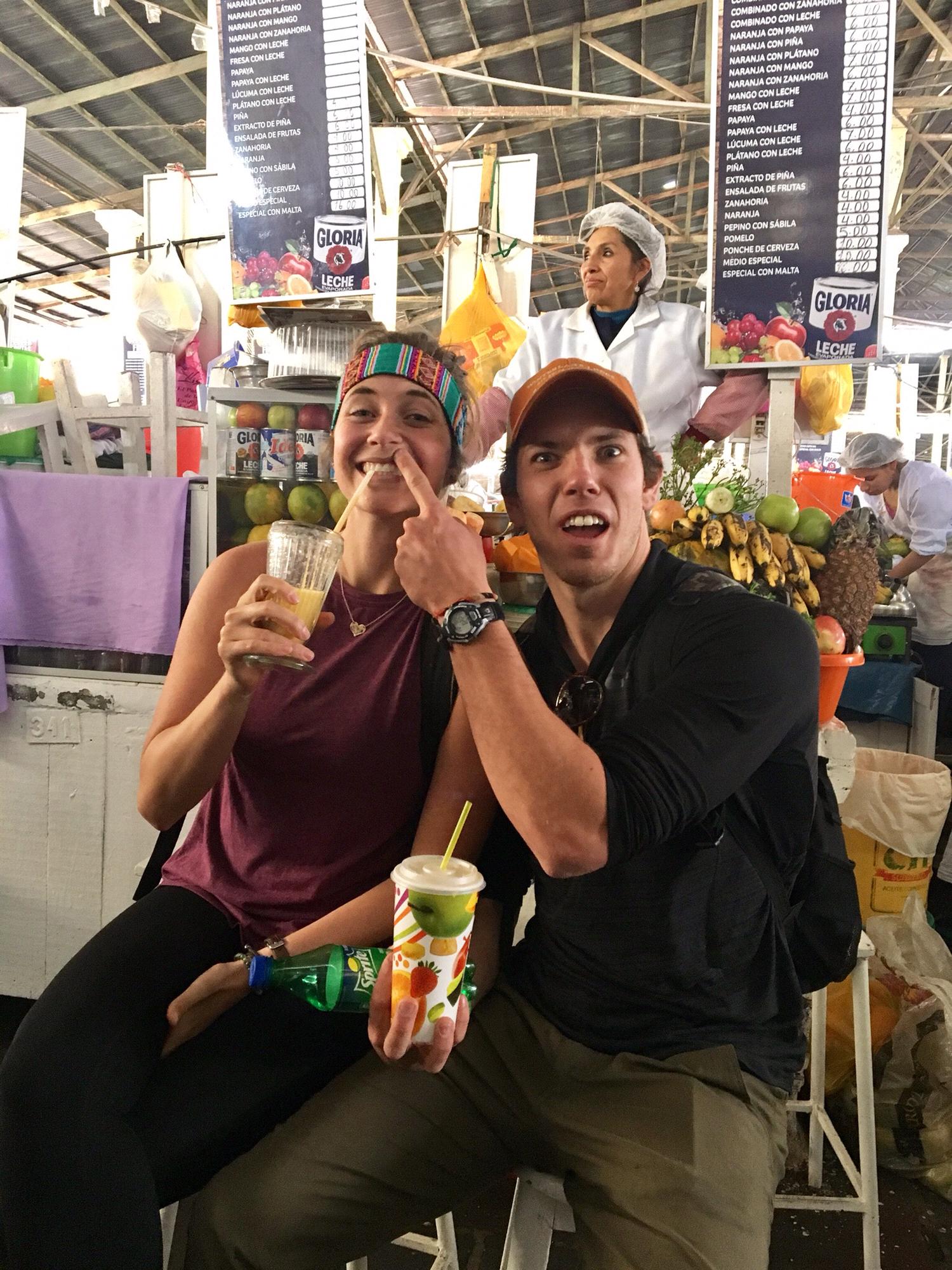 Getting juice at the market in Peru