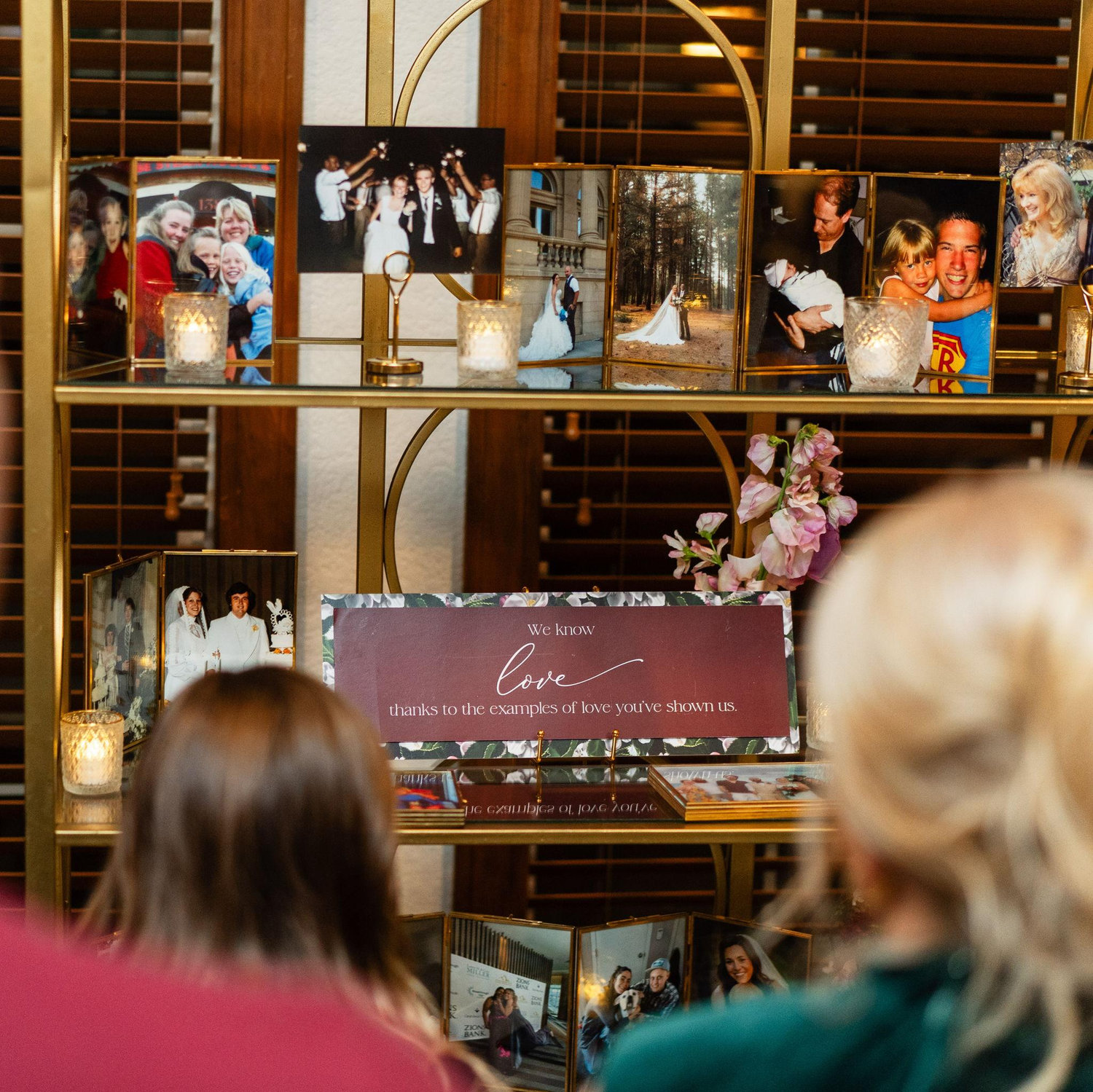 'We know love because of the love you have shown us': an ode to the many forms of love shown throughout the room, with a photo of every guest included.