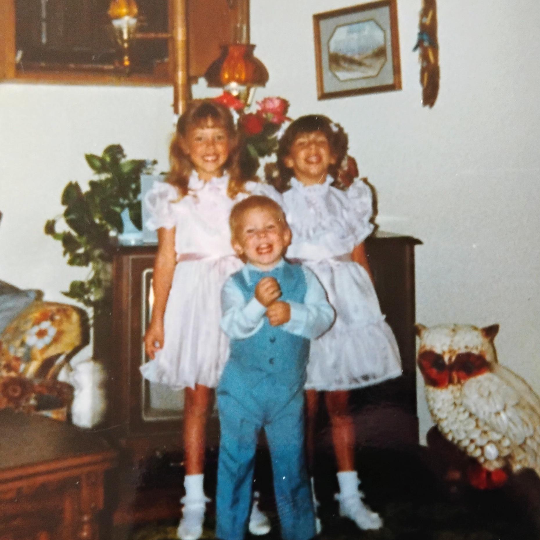 Alan with his sisters Jen and Jess.