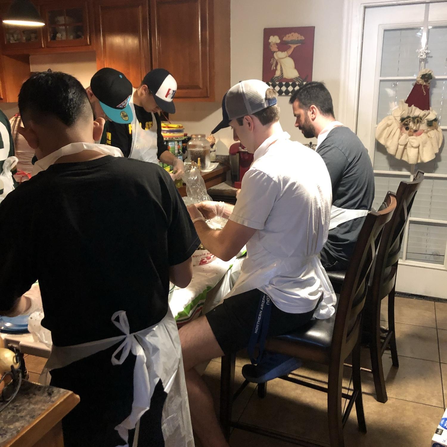 Ryan joined the tamale line, a job he LOVES doing every Christmas season ;)