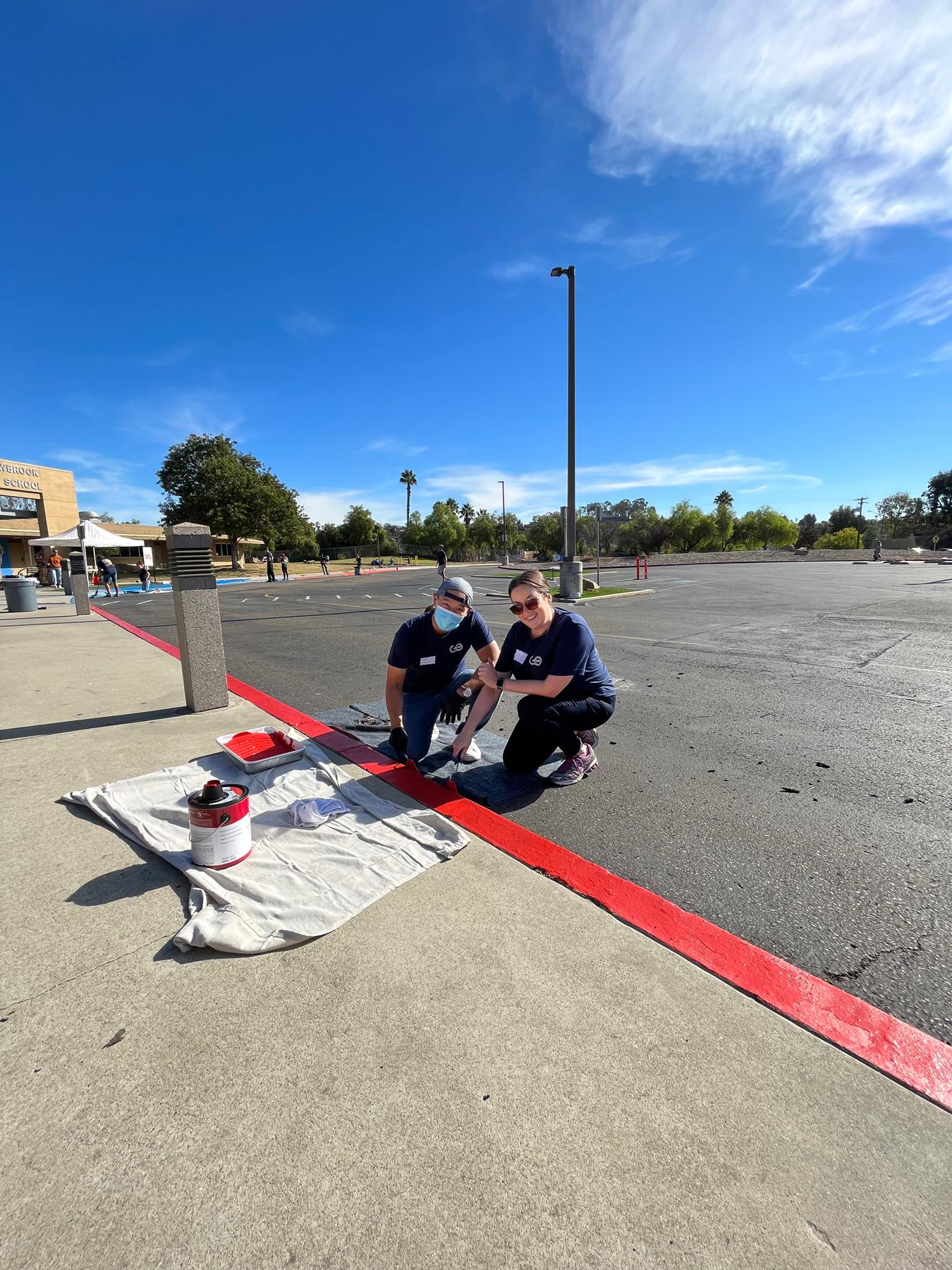 Alicia and Fri on Serve Day. Helping fix up a local school through their church.