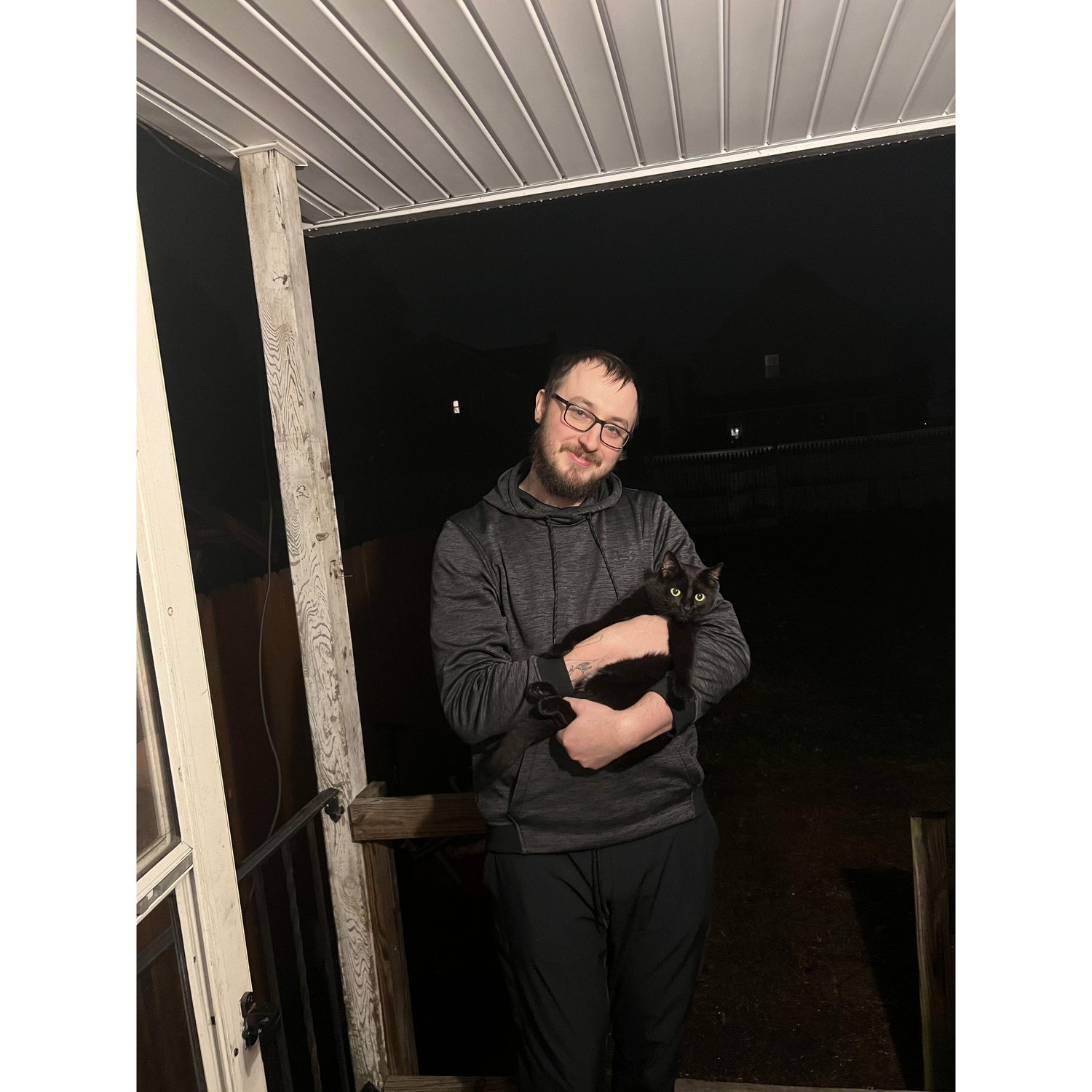 Rare pic of Tristian holding Bagheera for one of the first times