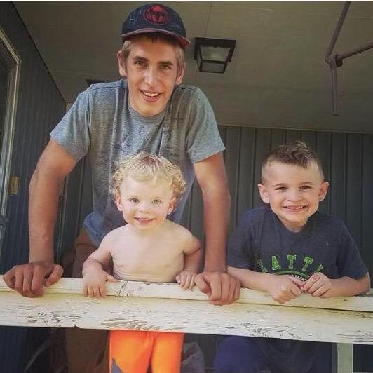 Isaiah, Britton, and Bowen on grandma Patty's porch