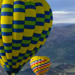 Balloons Above the Valley