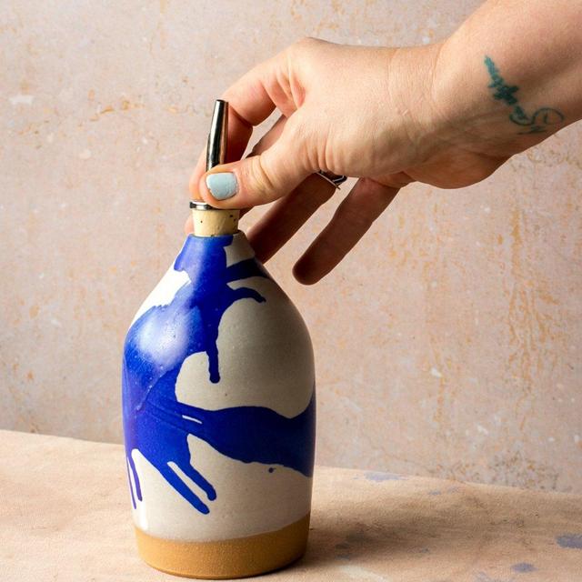 Settle Oil Bottle- Royal Splash