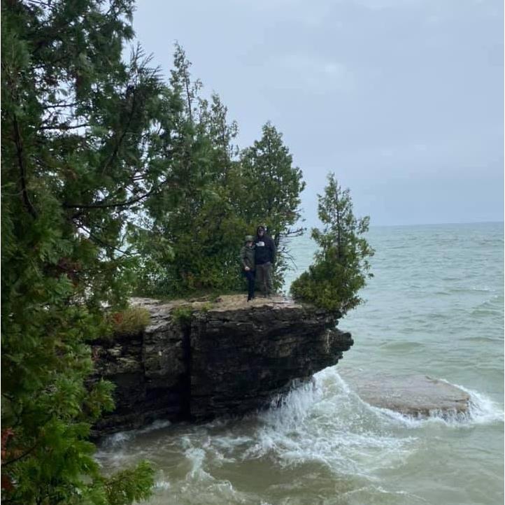 Do you see us??? It's like we camouflage right in. Especially with my green jacket. This was taken at Cave Point Park in Door County, Wisconsin. Same day and place we got engaged!