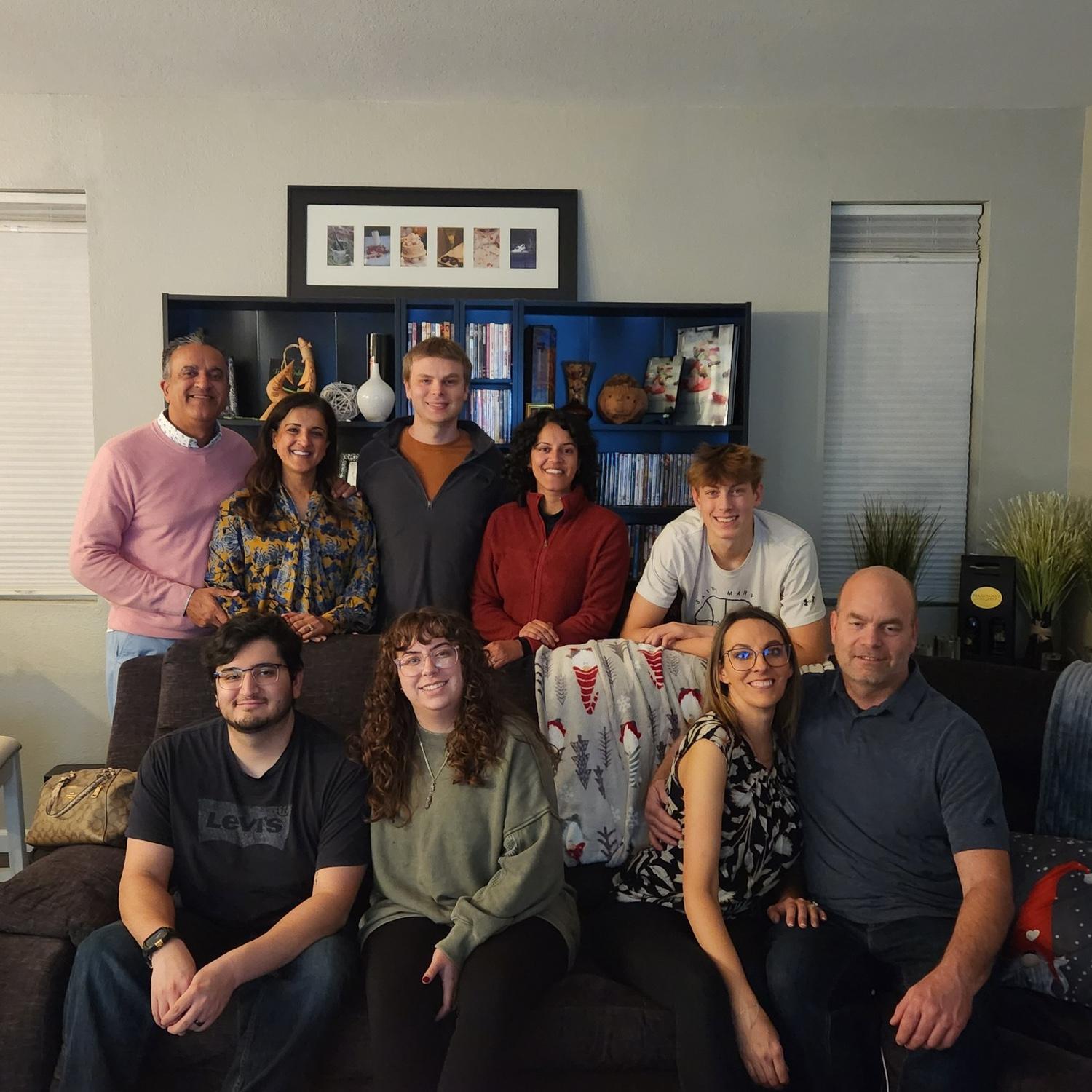 With Kiran's parents, family friends Brenda and Matt (bottom right), their son Brock (top right), and daughter Sierra and her partner Isaiah.