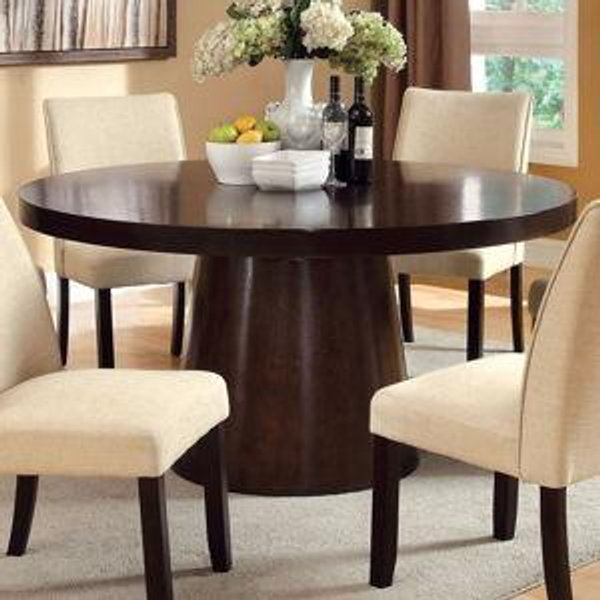 A dinner table and chairs