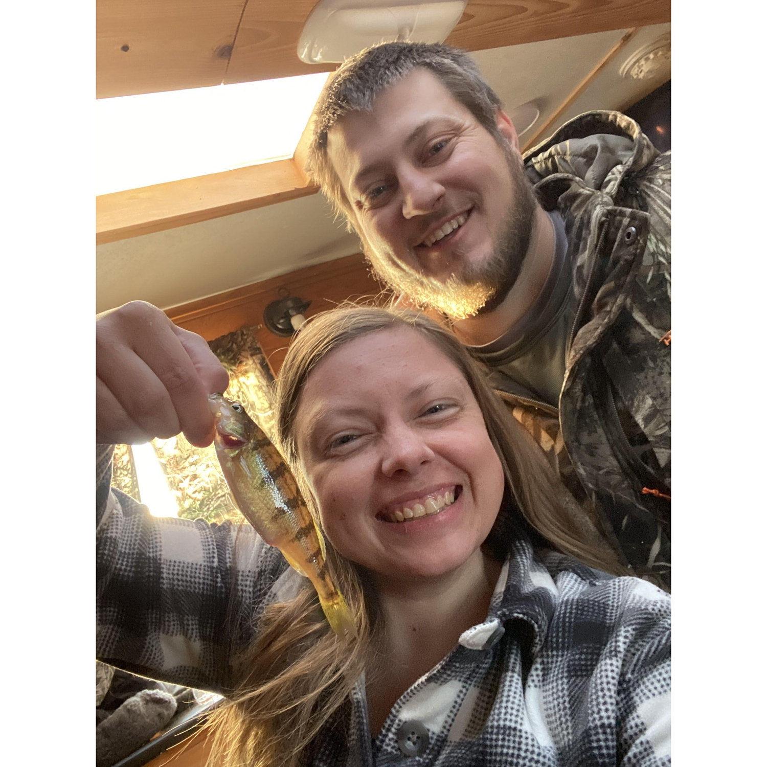 One of our many fishing dates! Pictured is the first catch of the day, by Anna!