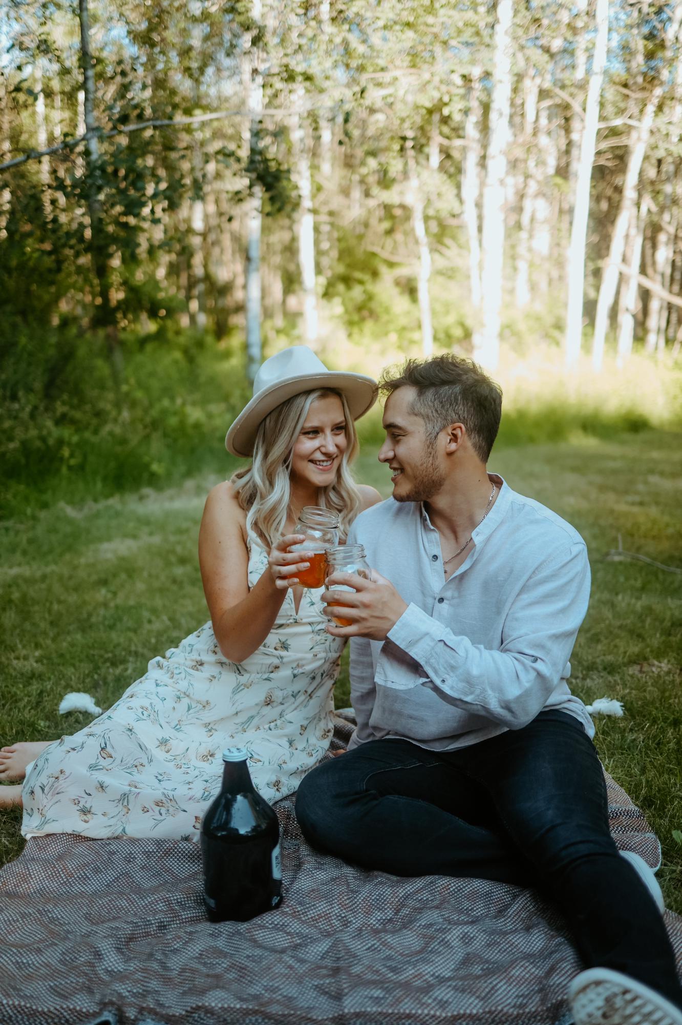We love going to breweries together, so we incorporated this into our engagement photos with a little picnic scene. Engagement photos by Daniela Buvat :)