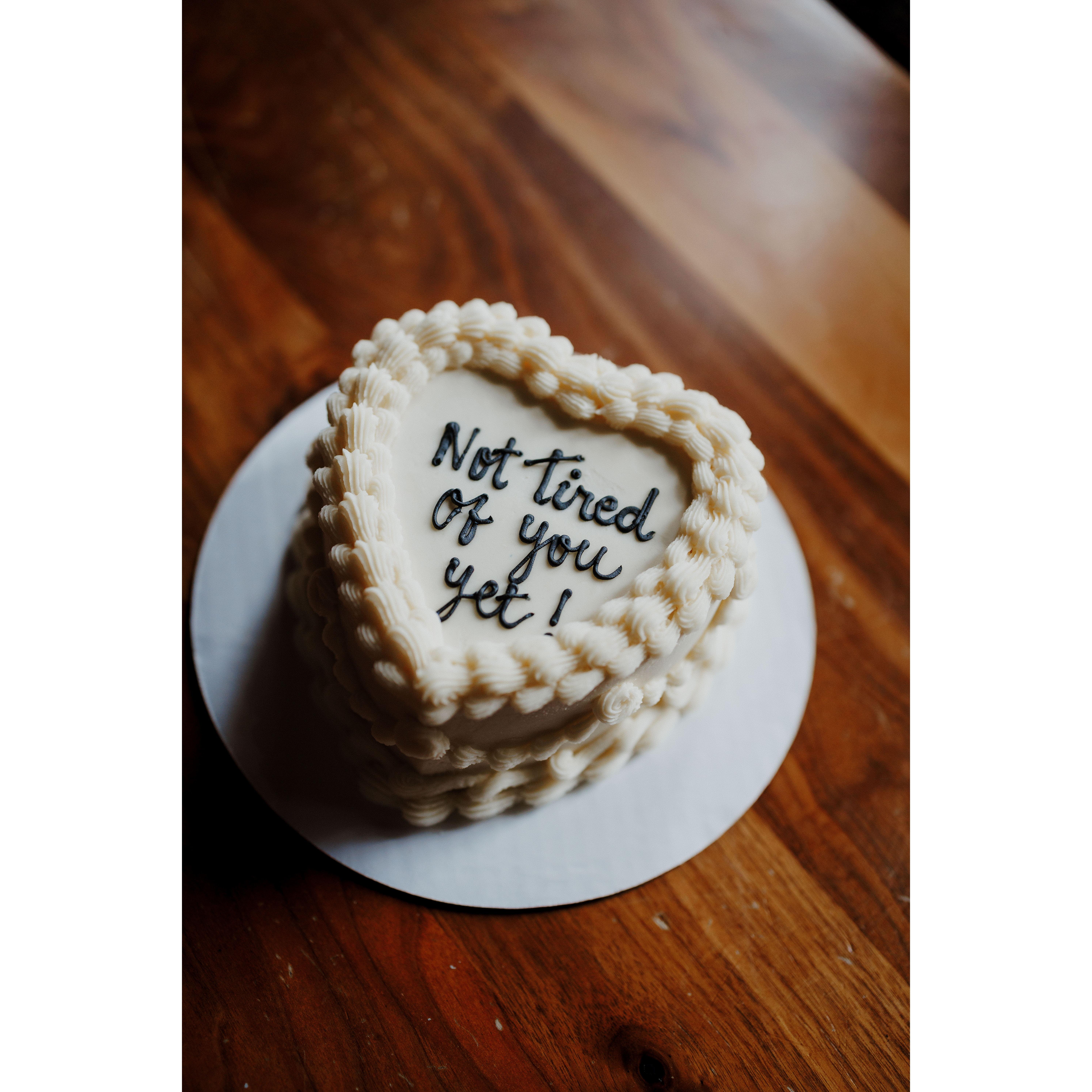 It only made sense for our favorite tongue-in-cheek saying to be on our cake