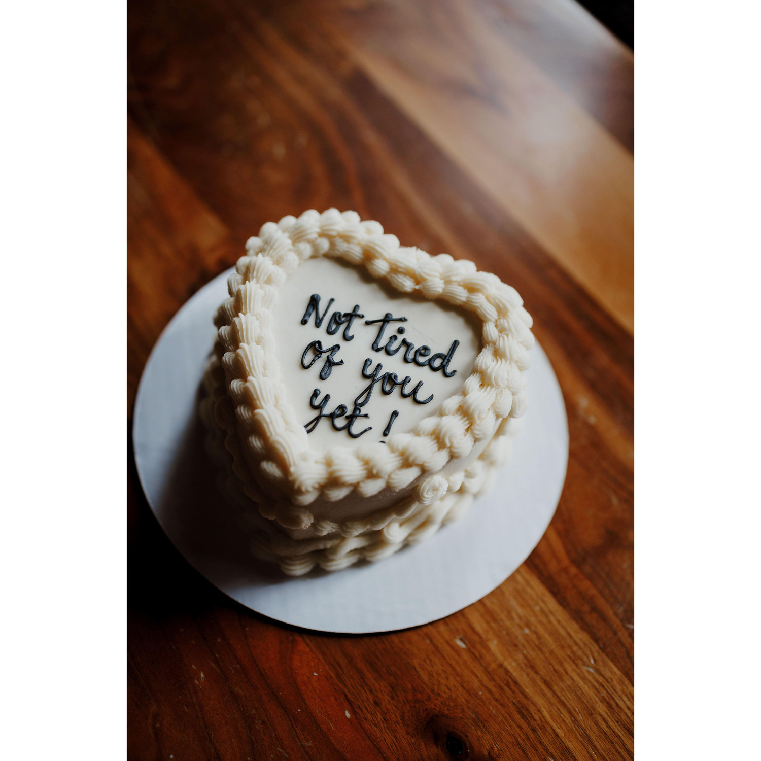 It only made sense for our favorite tongue-in-cheek saying to be on our cake