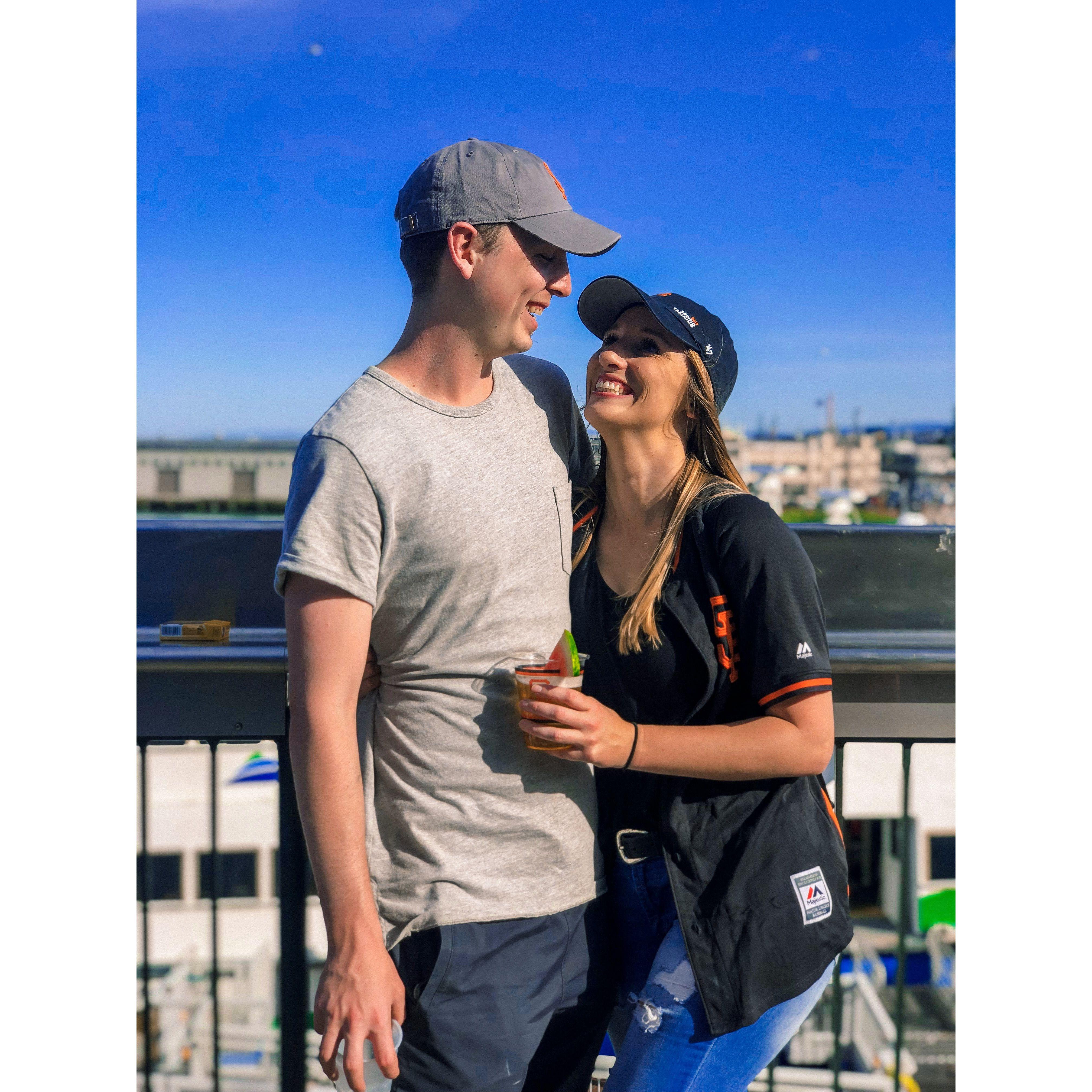 Alec attending another Giant's game with Rebecca