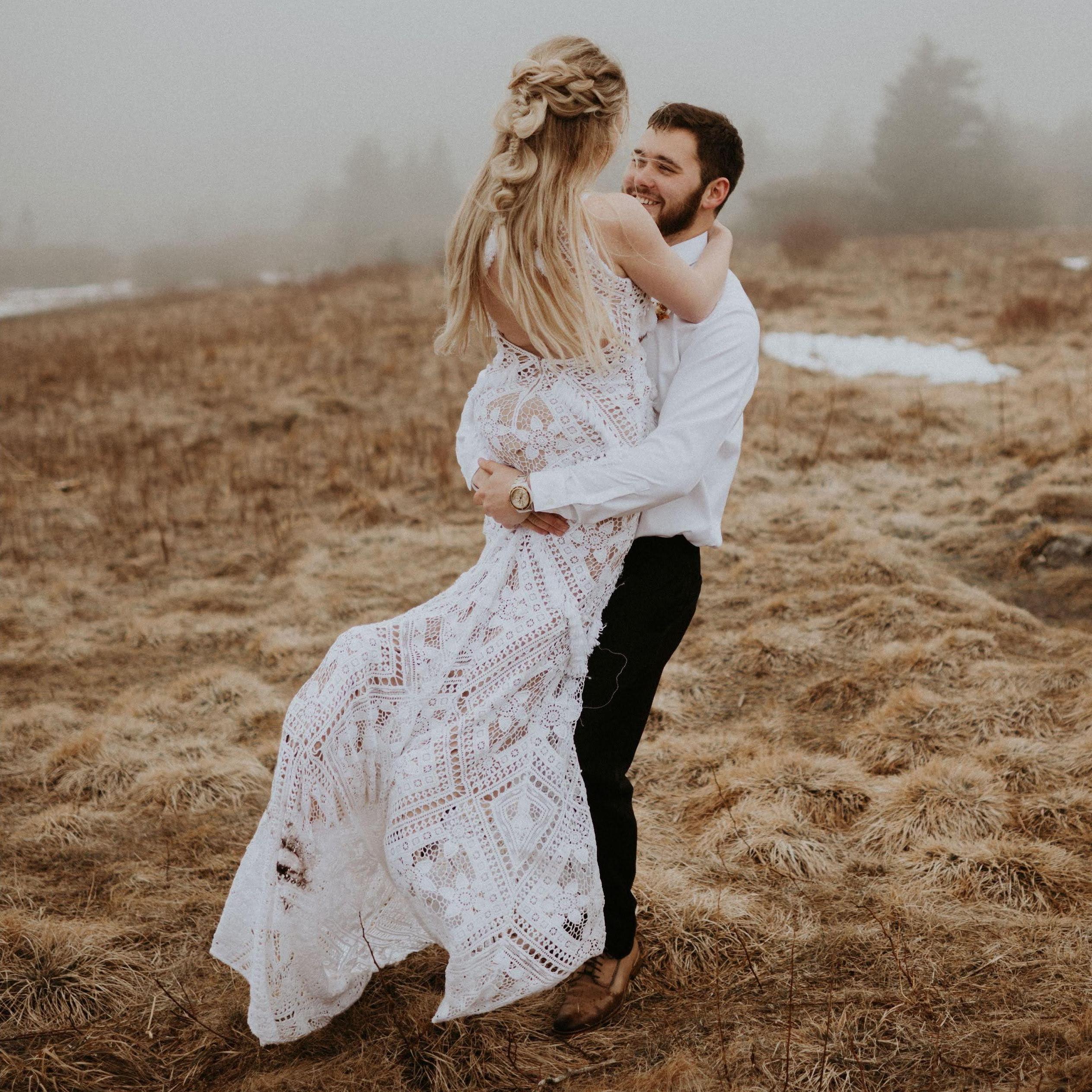 Bridal portraits from photoshoot on proposal day, spinning around together on Roan Mountain. (February 12, 2021)