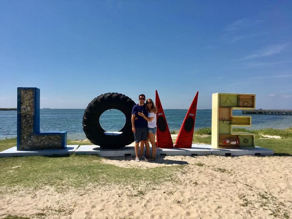 Posing in front of an aptly titled sign visiting Nate’s parents on the Eastern Shore, VA.