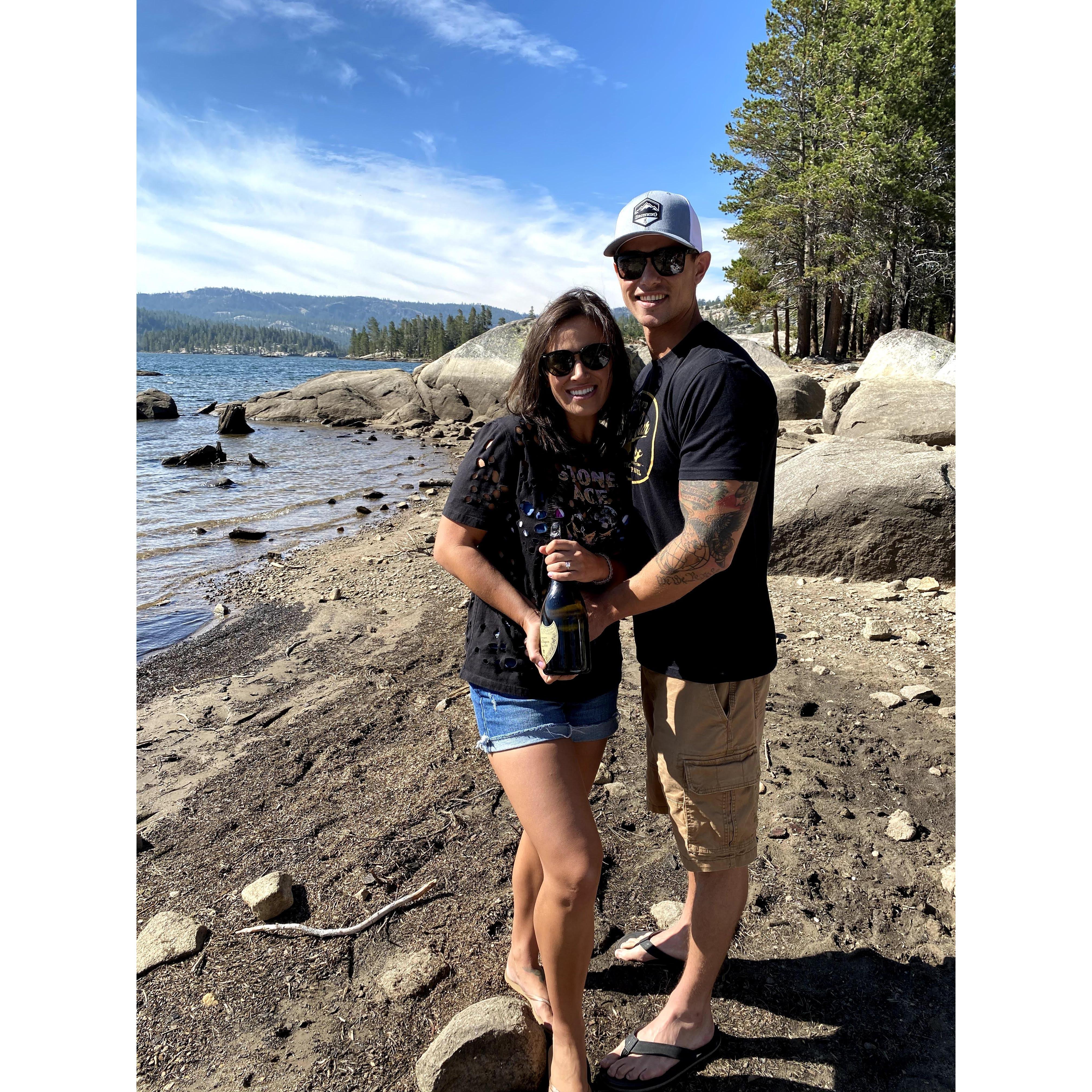 Justin thought of everything to make for a perfect proposal, including a fancy cheese board, beautiful bouquet, and a vintage bottle of 2008 Dom Perignon!