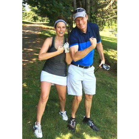Dad and Kait - flexing at Father's Day golf outing