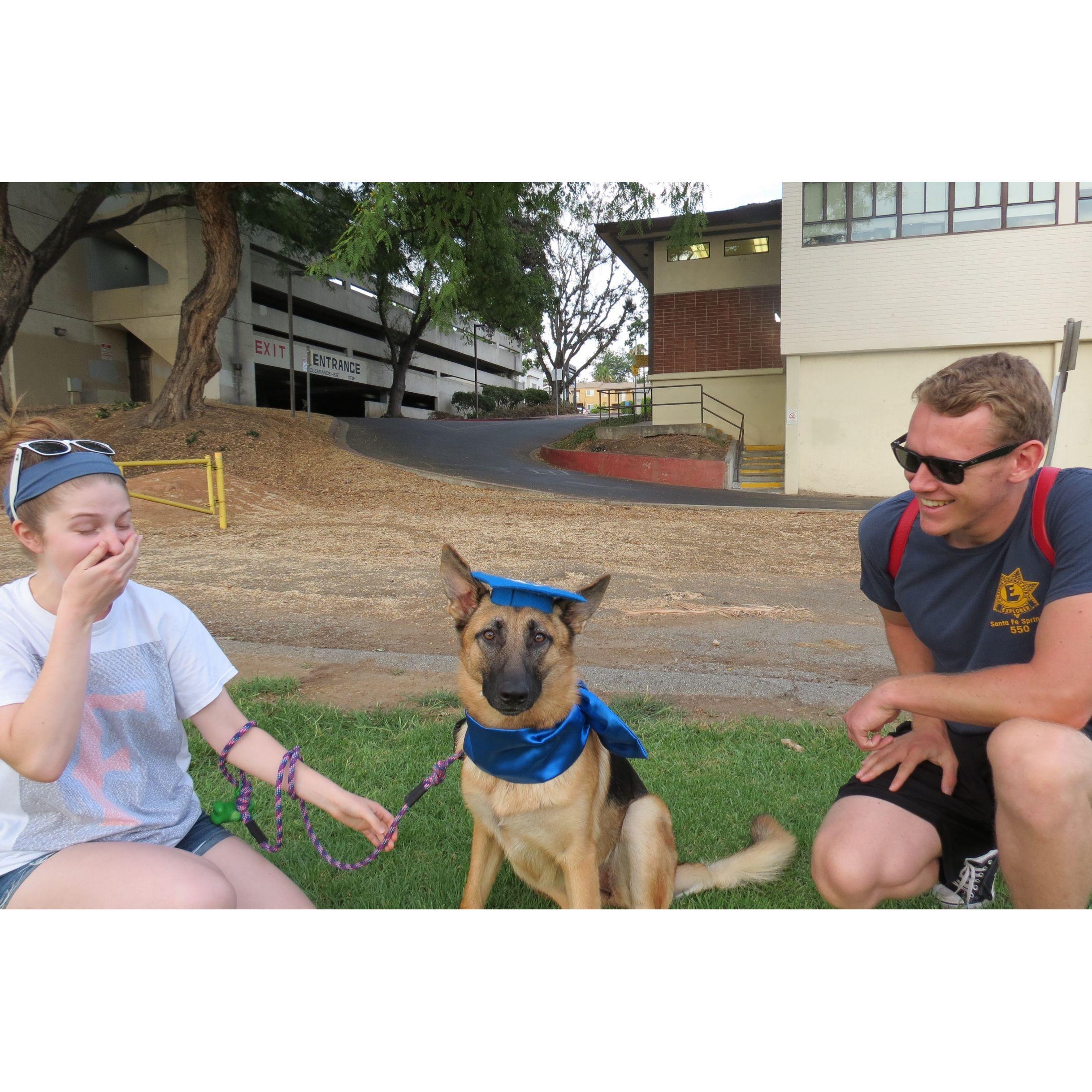 Proud dog parents when Pooka was a pup graduating obedience class