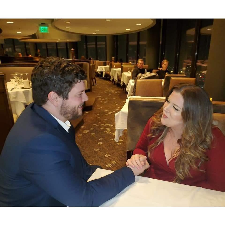 Chris had just gotten down on one knee to pop the question after we finished an amazing dinner at the Sun Dial.