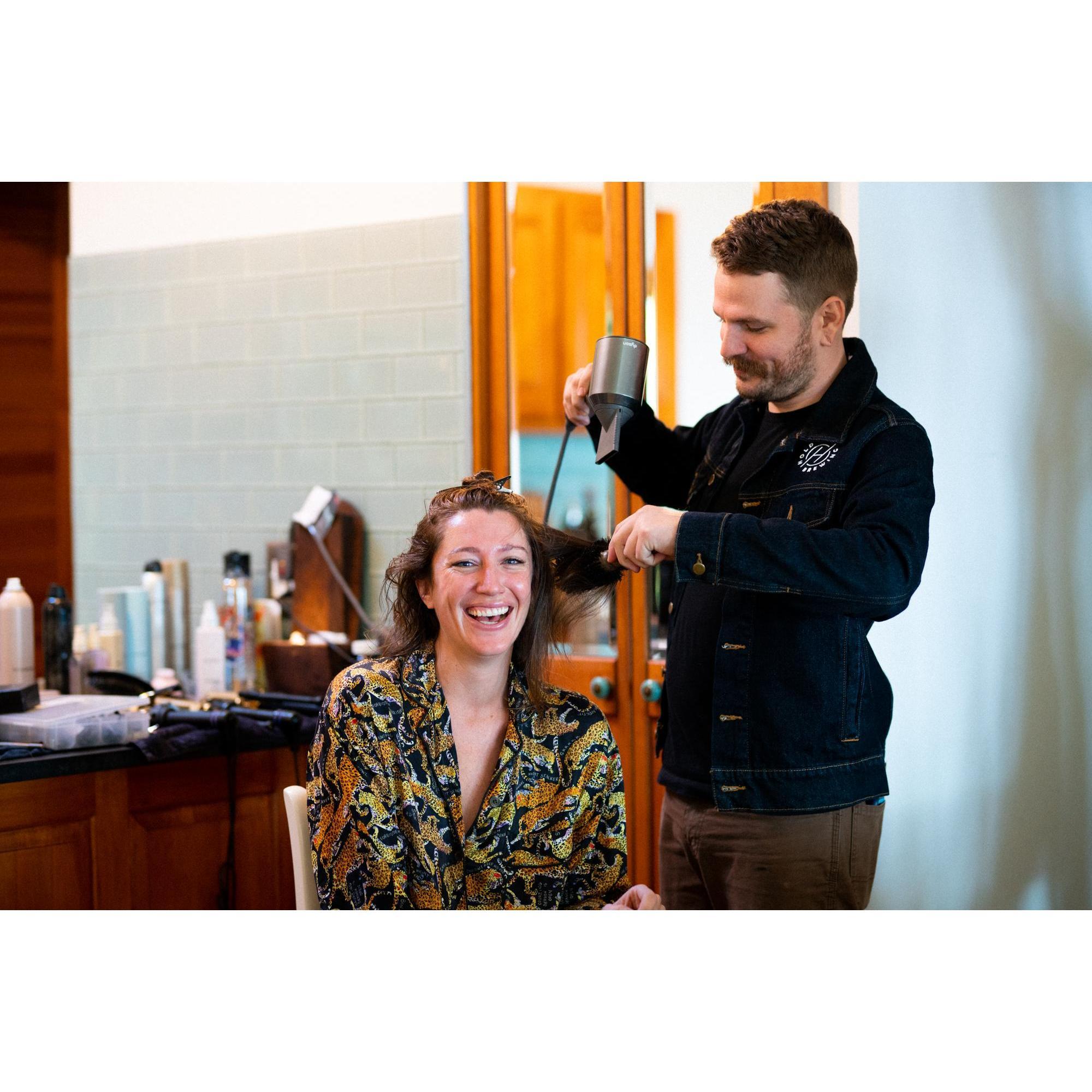 Seth doing my hair for the ceremony