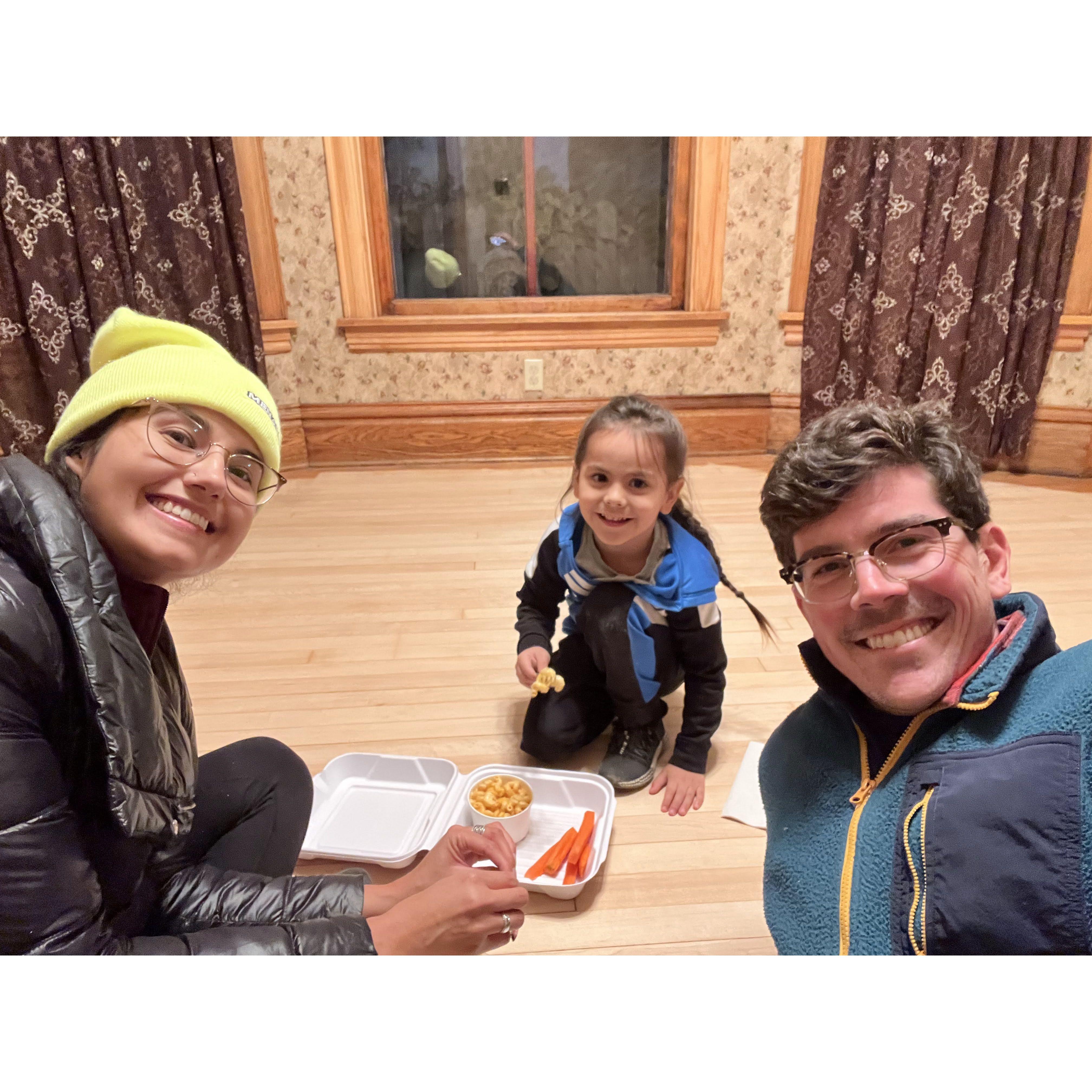 Meals with our nephew on the floor of our new house in October 2022