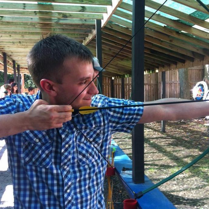 Our first date at the Renaissance Fair in NY. Jonny is much better at archery.