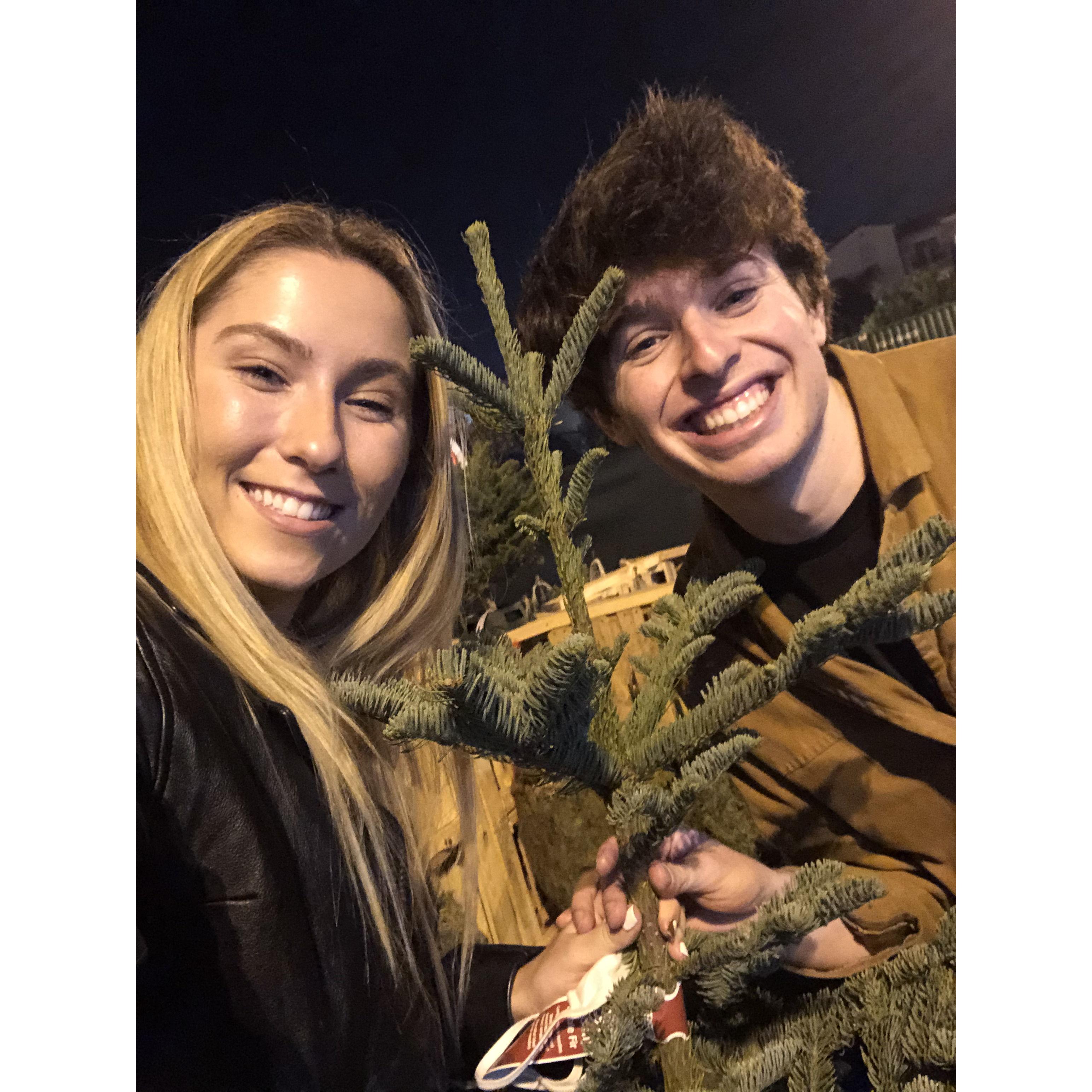 Buying our first Christmas tree together in December 2021!