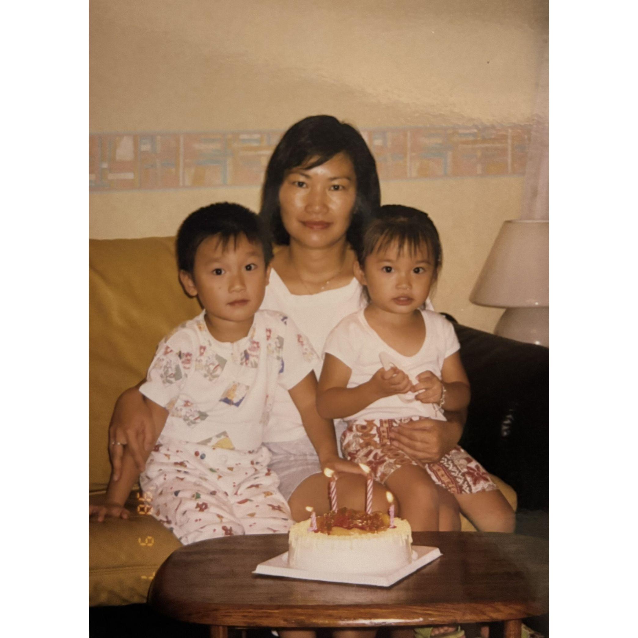 Rachel, her brother, and her mom - 1997