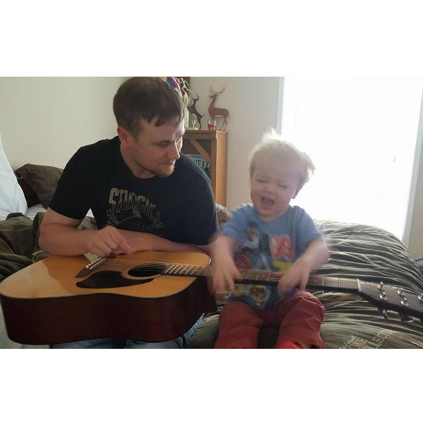 Anderson and Joe jamming out to some good tunes. As you can tell Anderson really enjoys the sound of the guitar!