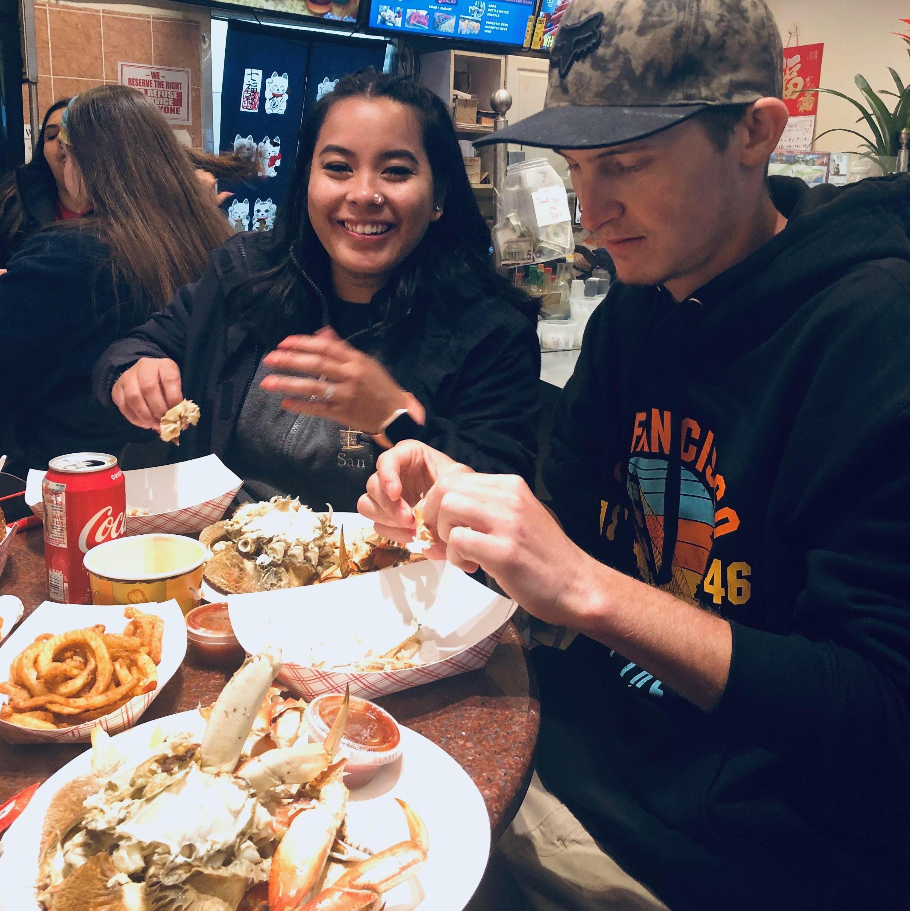 The celebration after the proposal. A walk down to the pier for some delicious crabs.