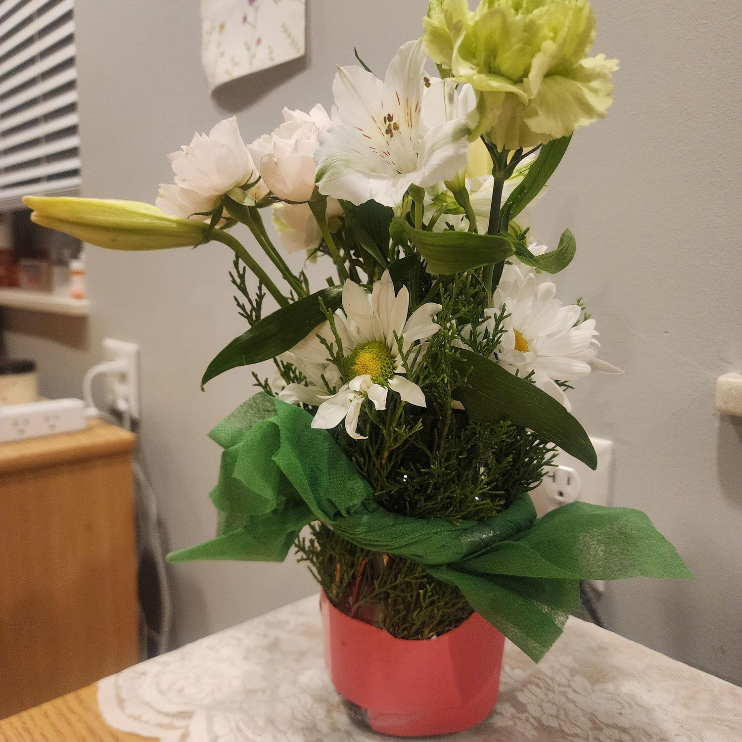 This was the first jar of flowers Keenan gave Elora! He borrowed the Jar from a friend, and used recycled items to dress it up :)