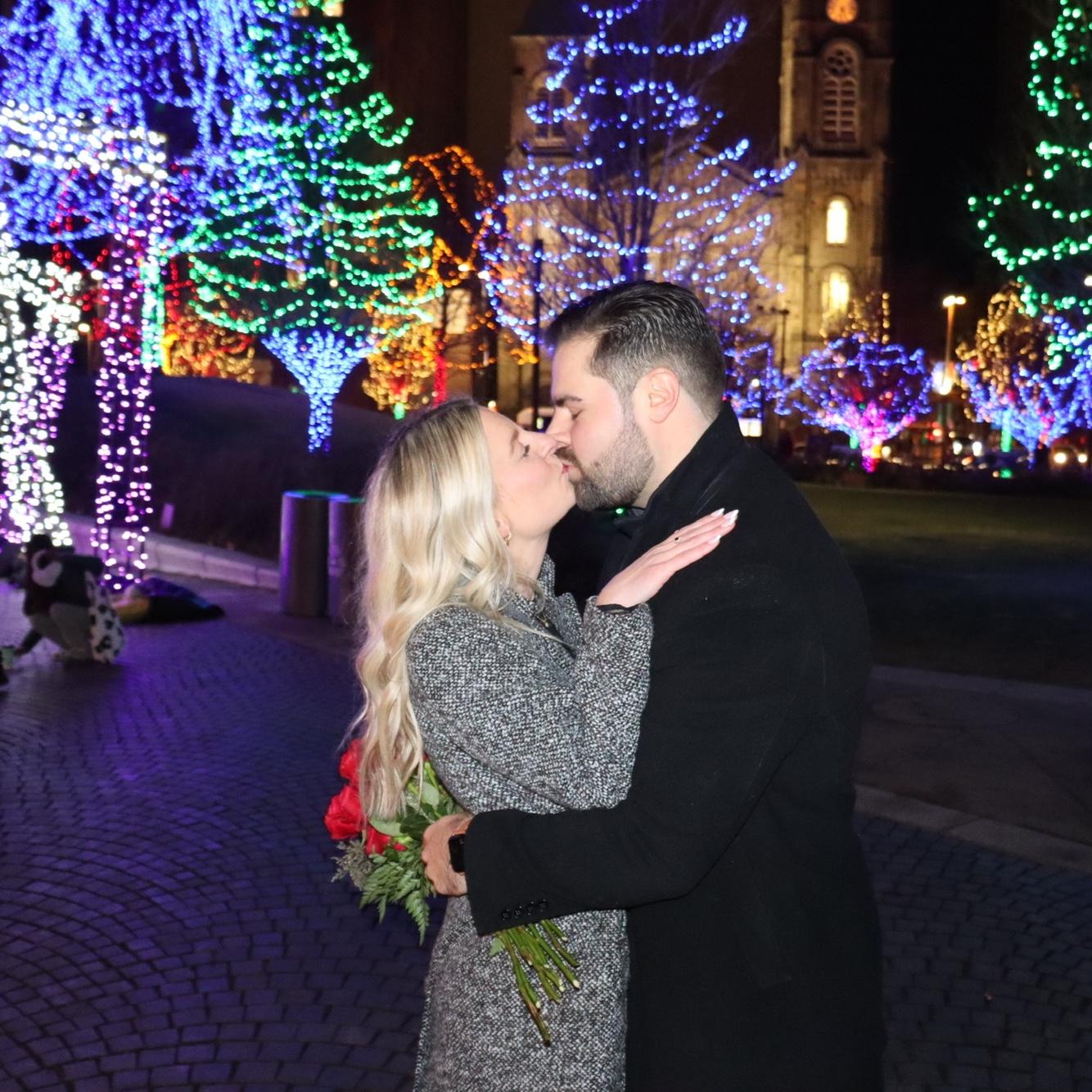 She said YES!!! Joe proposed under the Christmas lights in Cleveland’s Public Square