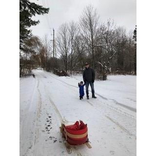 Brady and Jonny out for a sleigh ride and walk at the farm