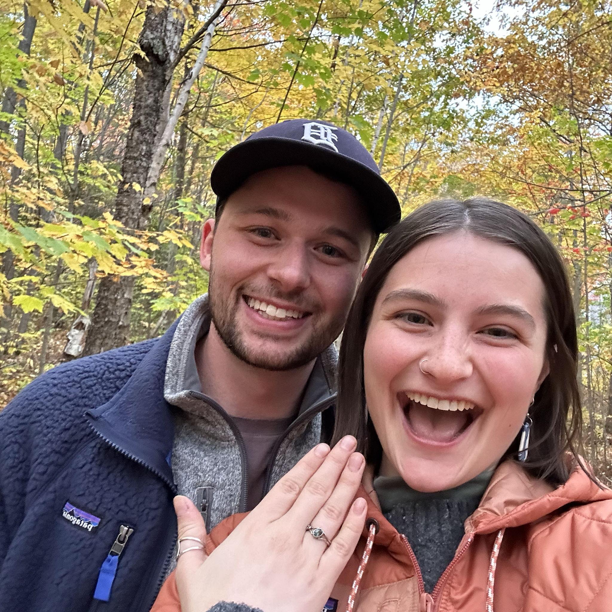 October 12th, 2024: We get engaged in the Apostle Islands! Just the two of us underneath stunning fall colors on a small hike during our fall trip!