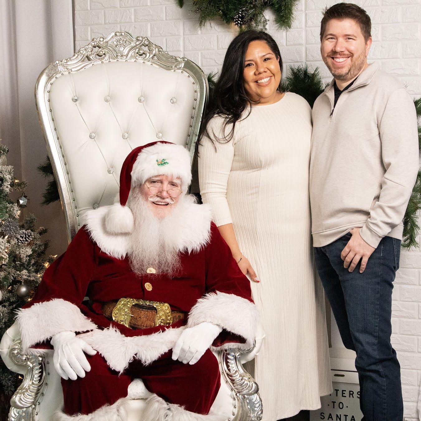 One of our first photos together; we met Santa in December 2024.