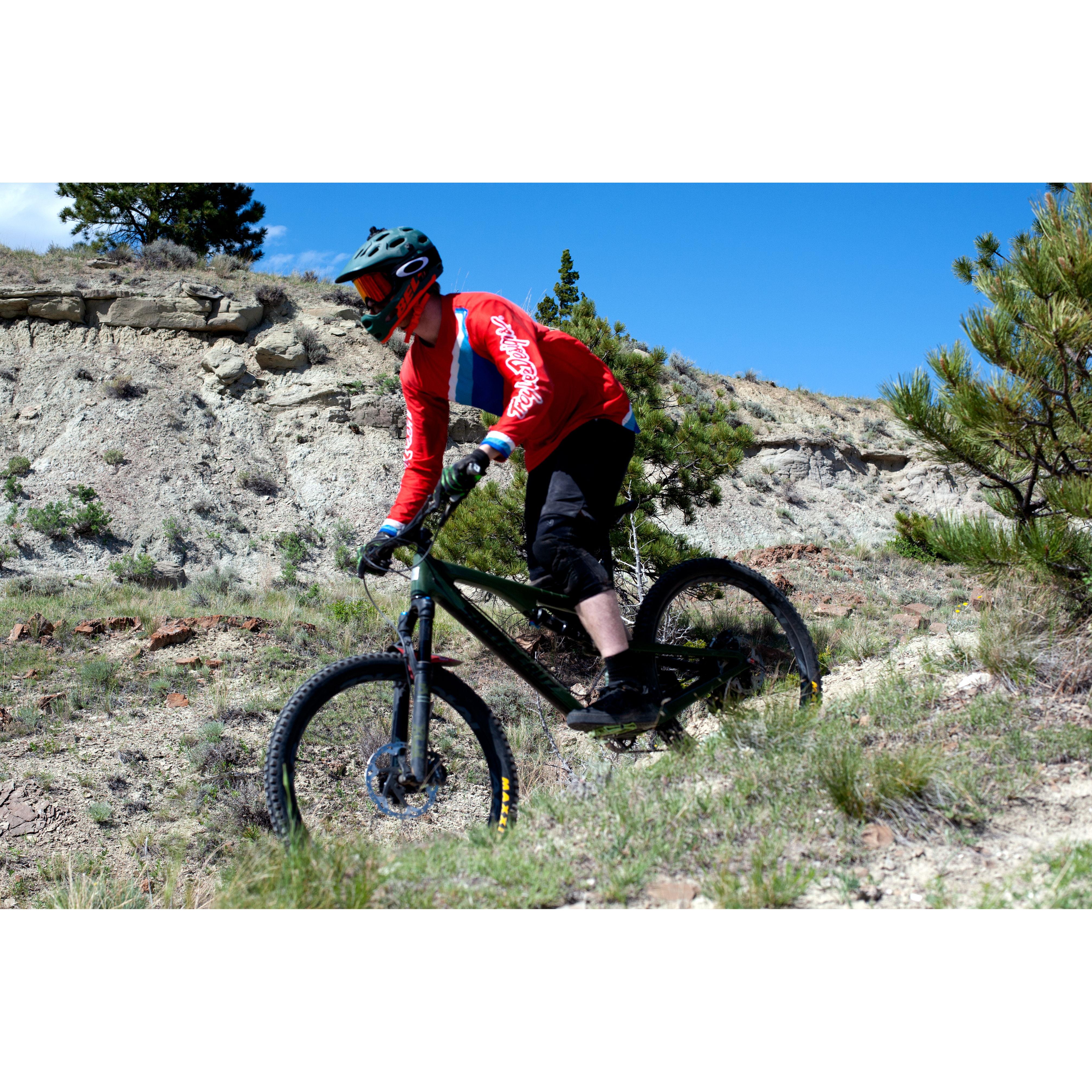 This photo was taken by his friend Wade while he was mountain biking in Acton, MT!