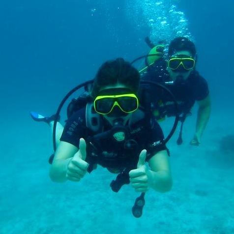 We love adventures and exploring- Scuba diving!