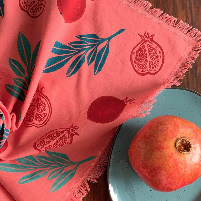 Pomegranate cotton napkin, tea towel or table runner. Linocut print on coral colored cotton. Handmade, own design.