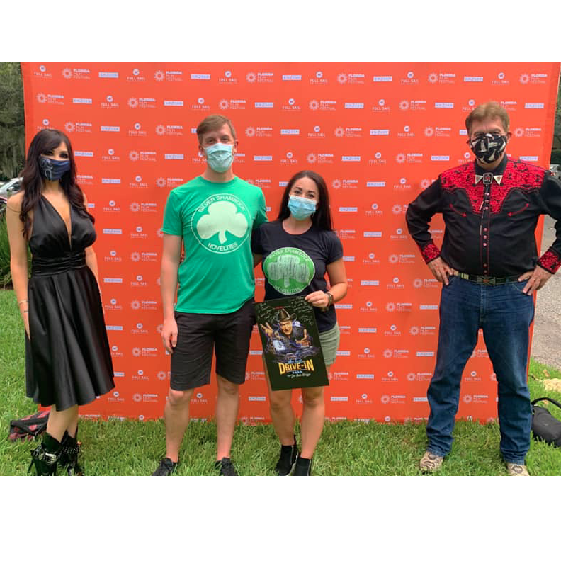 That time during the pandemic when we got to me Darcy the Mail Girl and Joe Bob Briggs at The Enzian and have them sign a poster and hassle JBB about not showing Halloween III on The Last Drive-In.