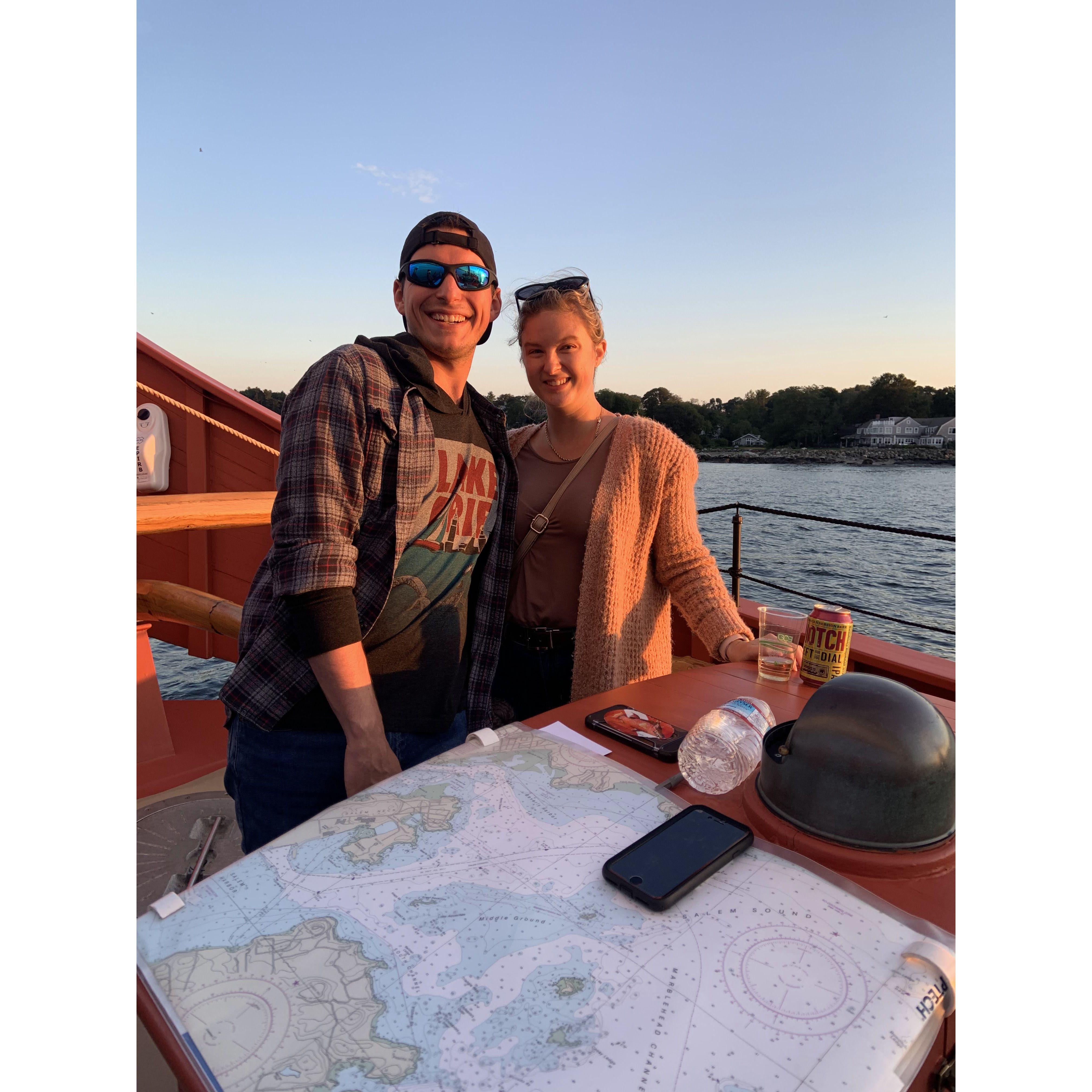 On our trip to Salem, Jamie surprised Steven with tickets for a sunset boat ride on the Salem Sound. Steven got to steer the ship right before this was taken!