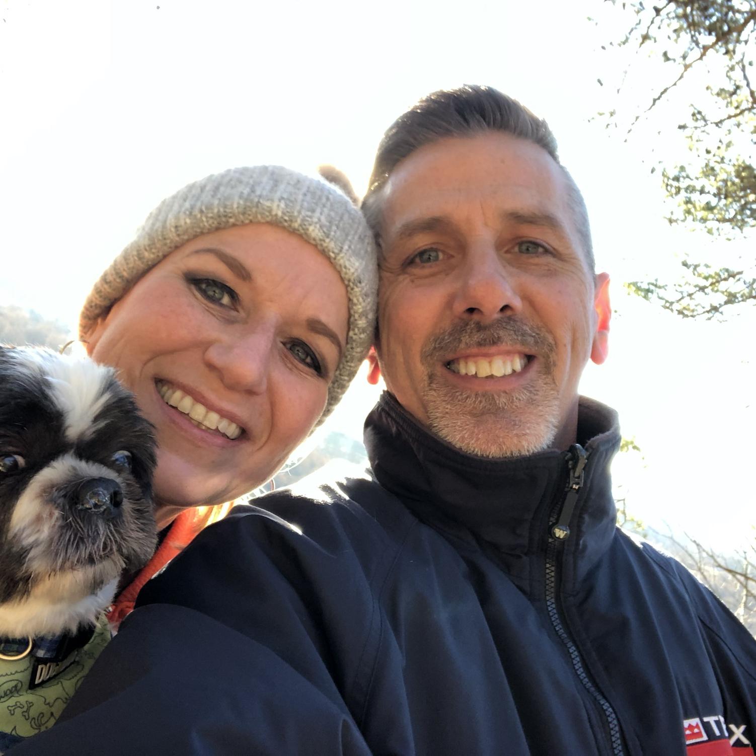 The couple enjoys hiking with the dogs.