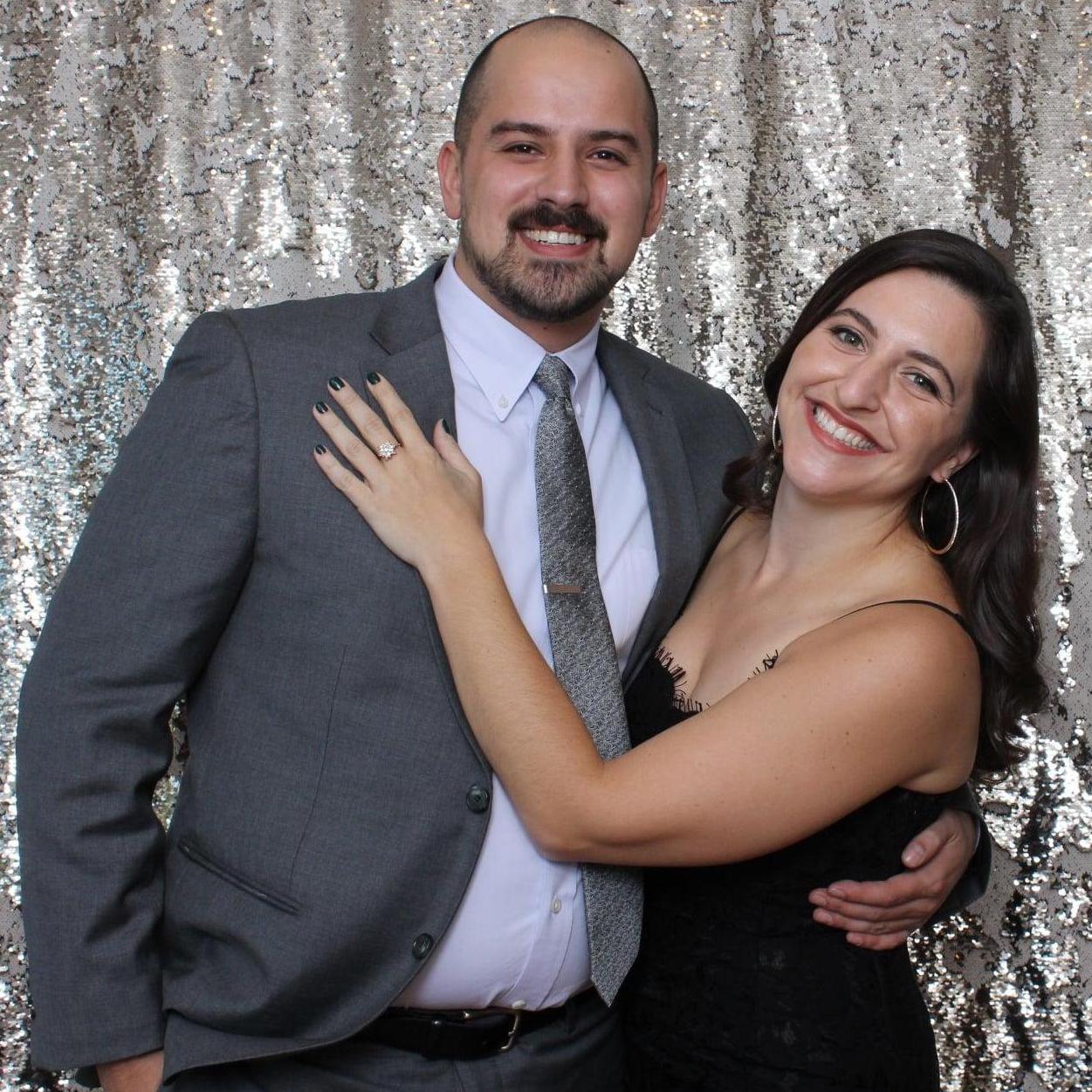 Lancaster, 2020 -- At one of the nearly 15 weddings we've attended together. Best wedding date ever!